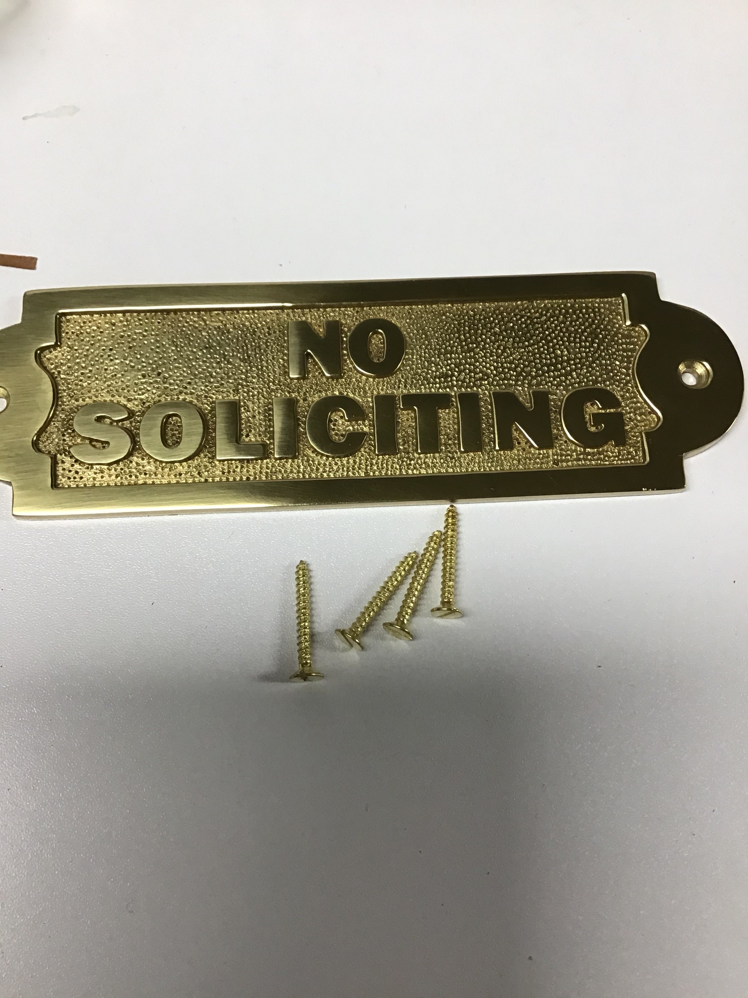 Sign, "No Soliciting"