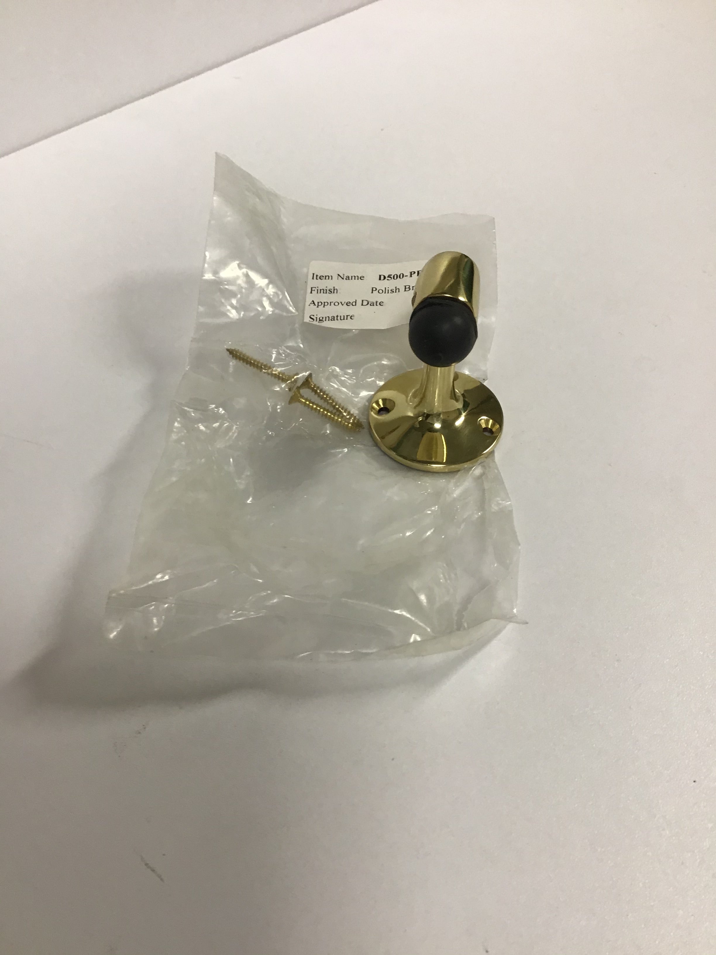 Brass door stop, rubber tipped