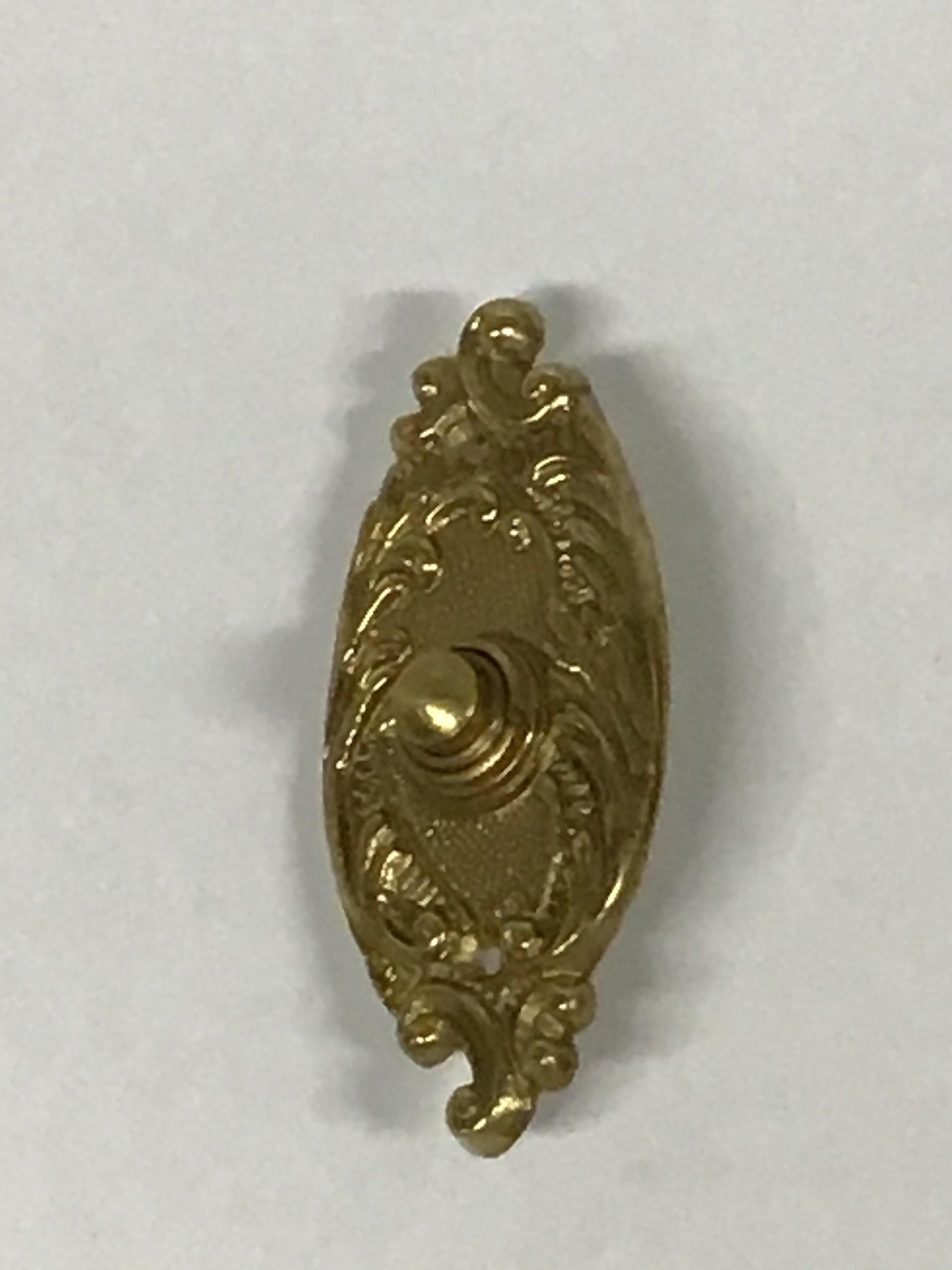 Brass ornate door bell switch