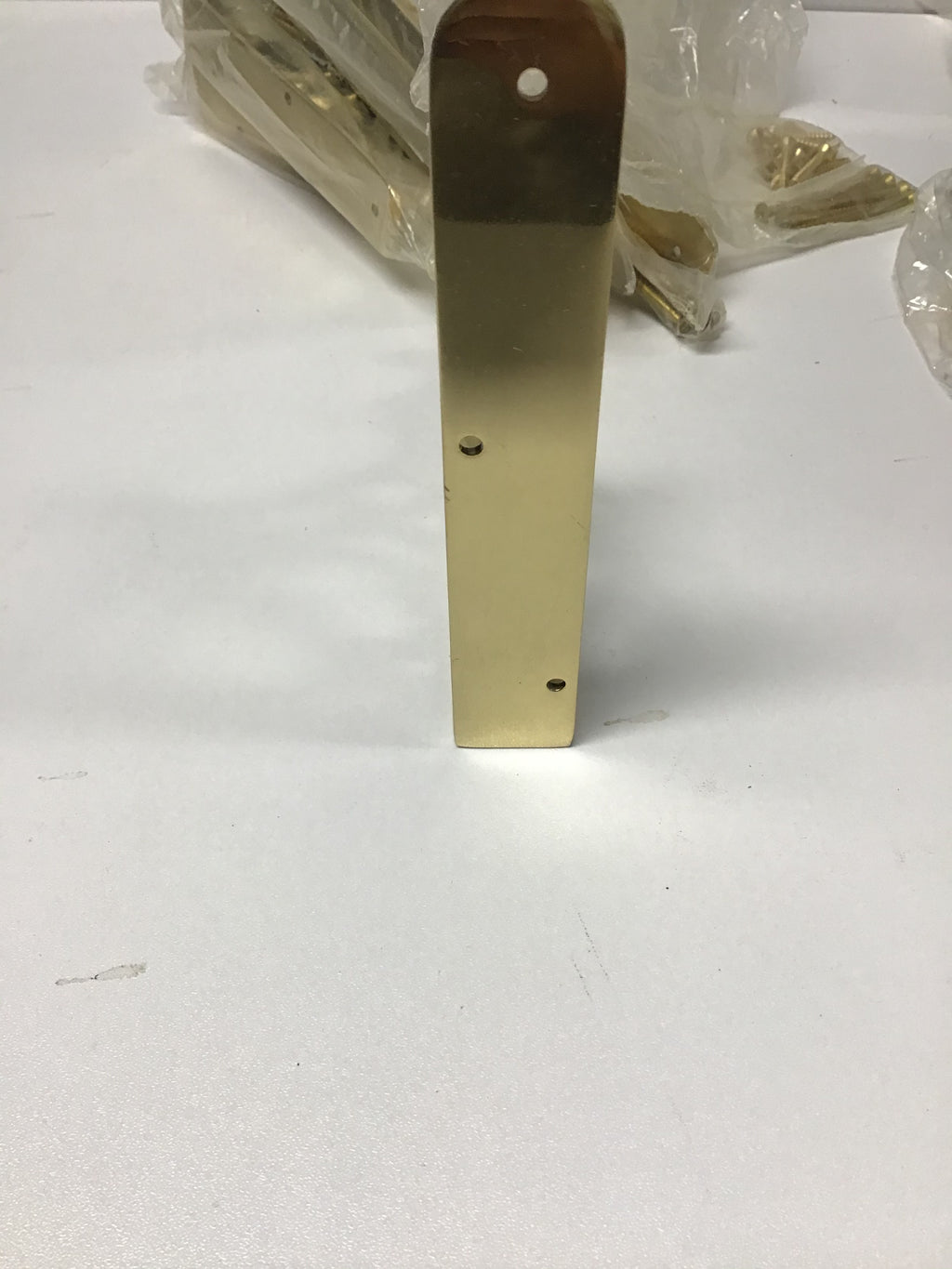 Brass shelf bracket