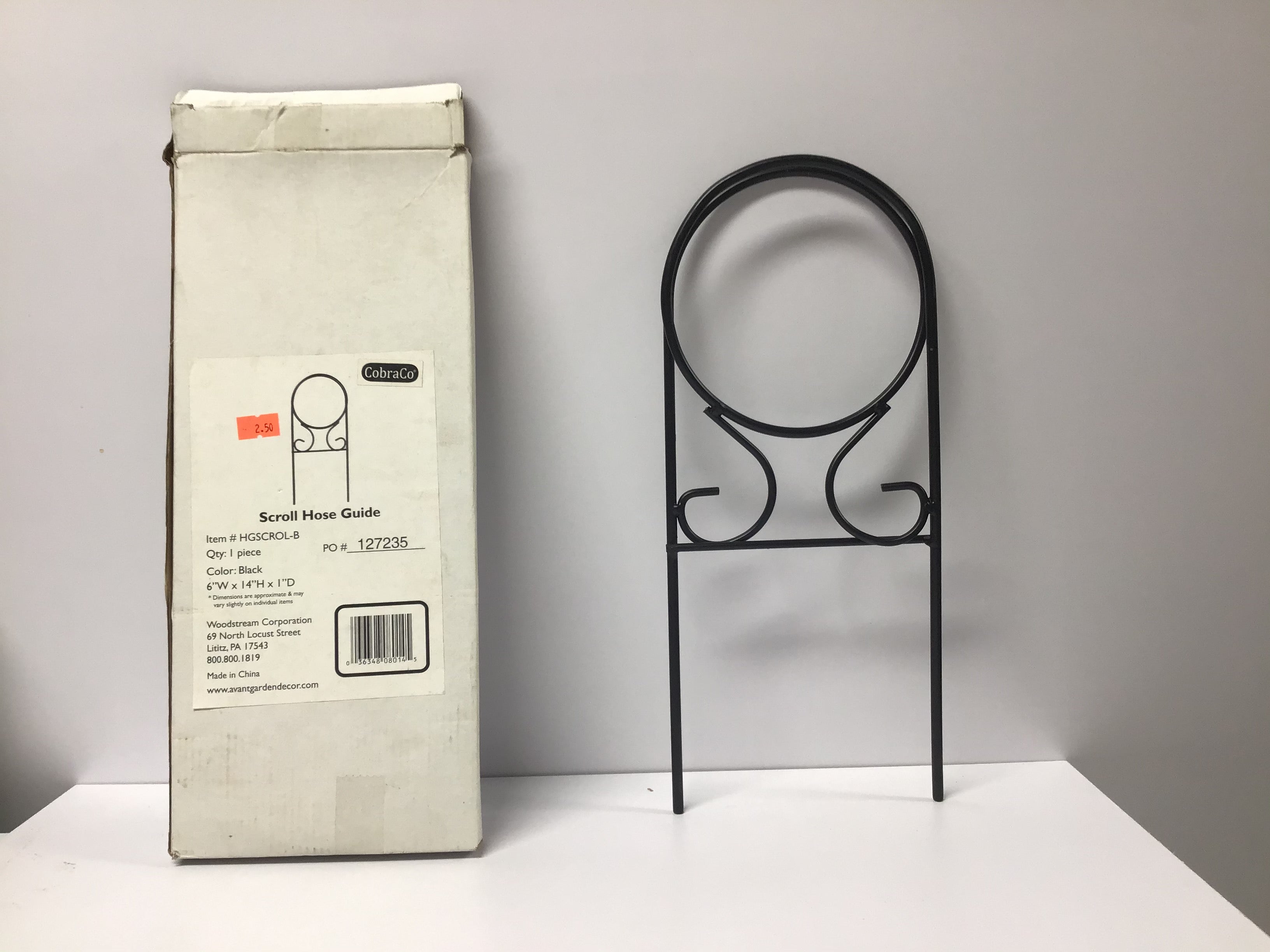 Scroll water hose guide