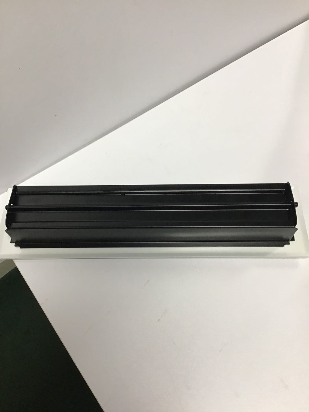 White ornate heating/cooling vent