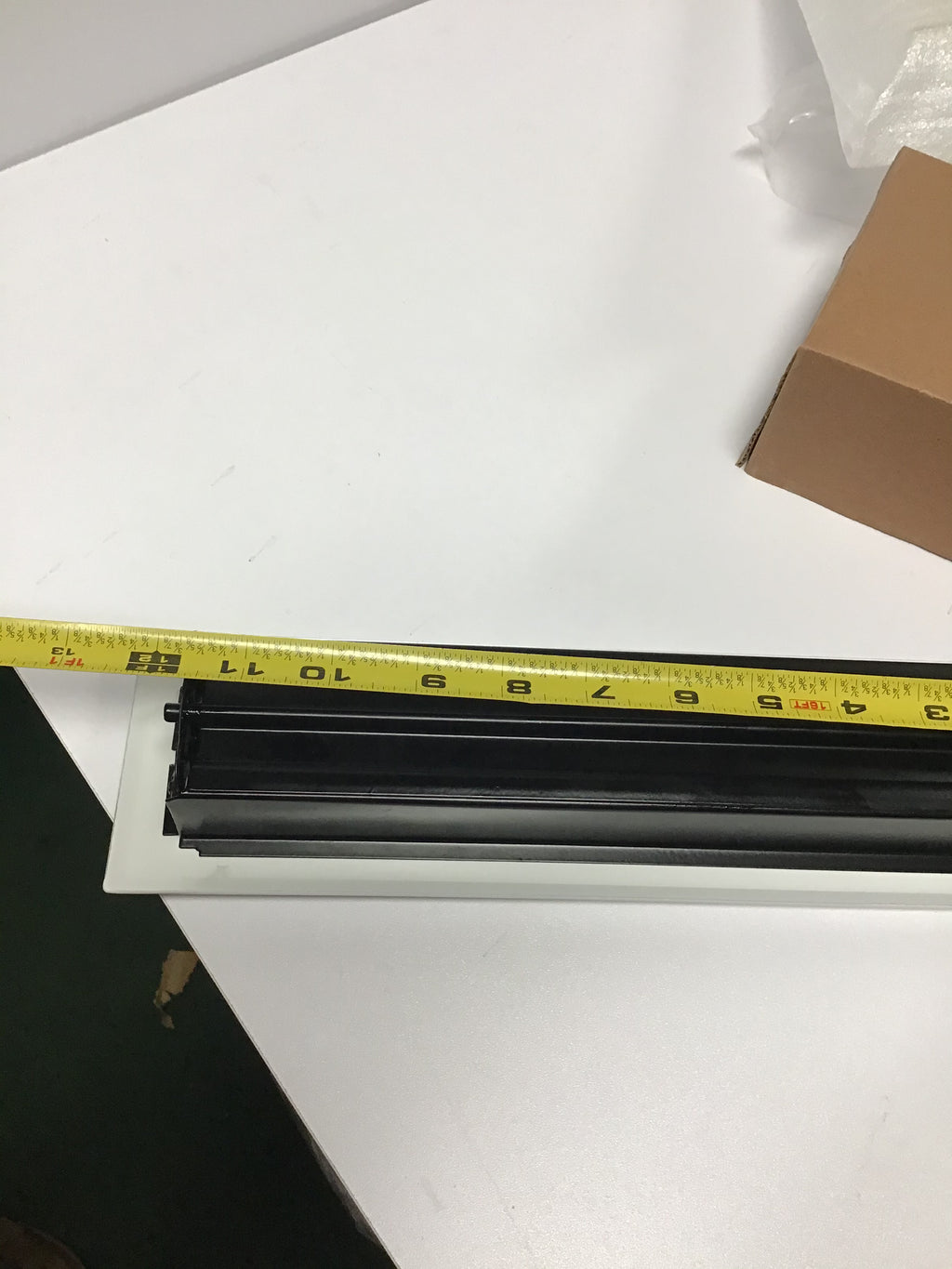 White ornate heating/cooling vent